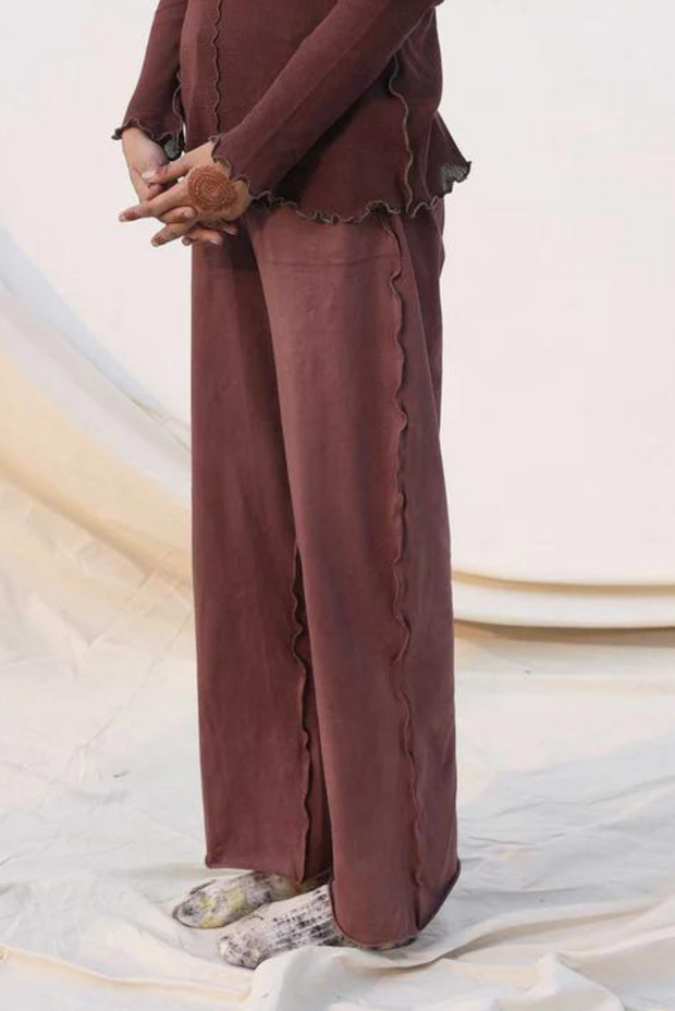 brown organic cotton trousers that have been hand-dyed