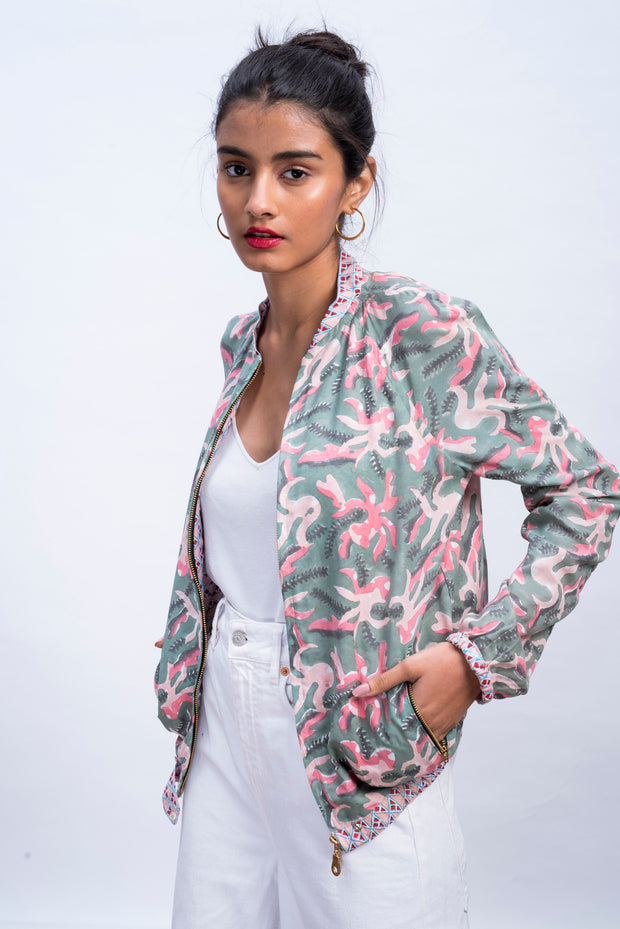 Front of womens muted octopus bomber jacket in 100% cotton