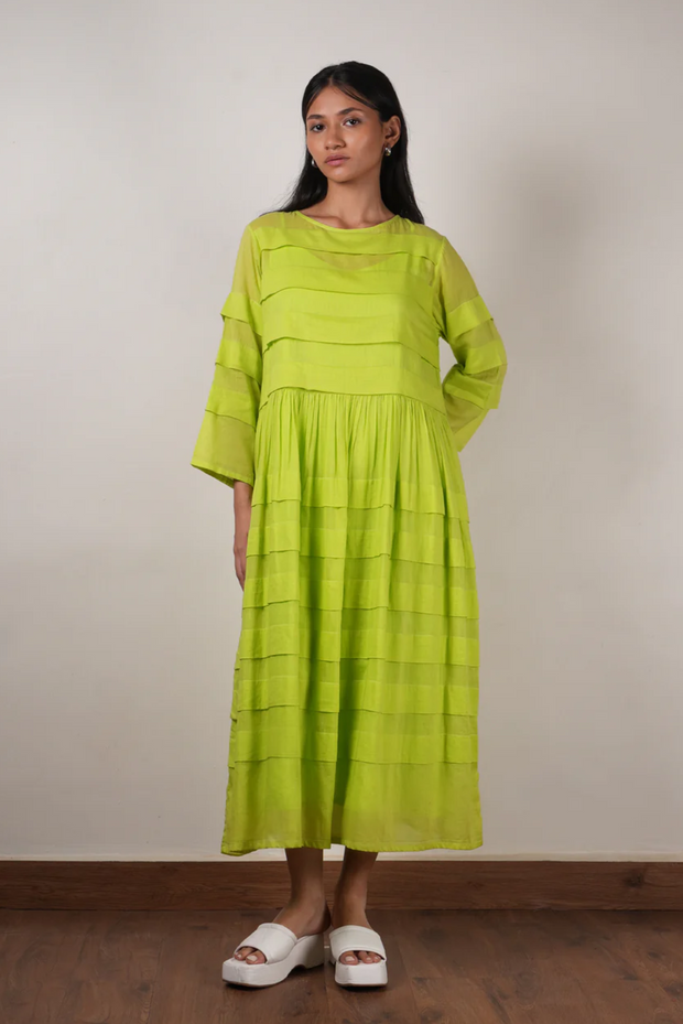 Neon green, sustainable brand, summer mul-mul dress, pleated design, side pockets, relaxed fit, chic look, comfortable style, lightweight fabric, breathable, eco-friendly material