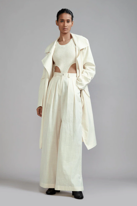 Off White, classic long trench jacket, side pockets, canvas belt, timeless, functional, sophisticated
