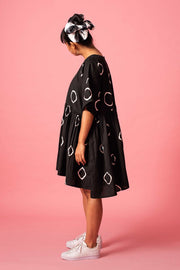 Side of Norblack Norwhite 100% handloom cotton mini dover dress at Omi Na-Na